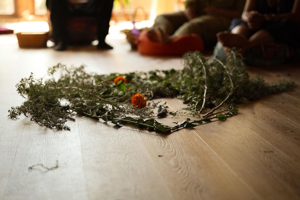 Dried herbs and flowers laid out at a retreat